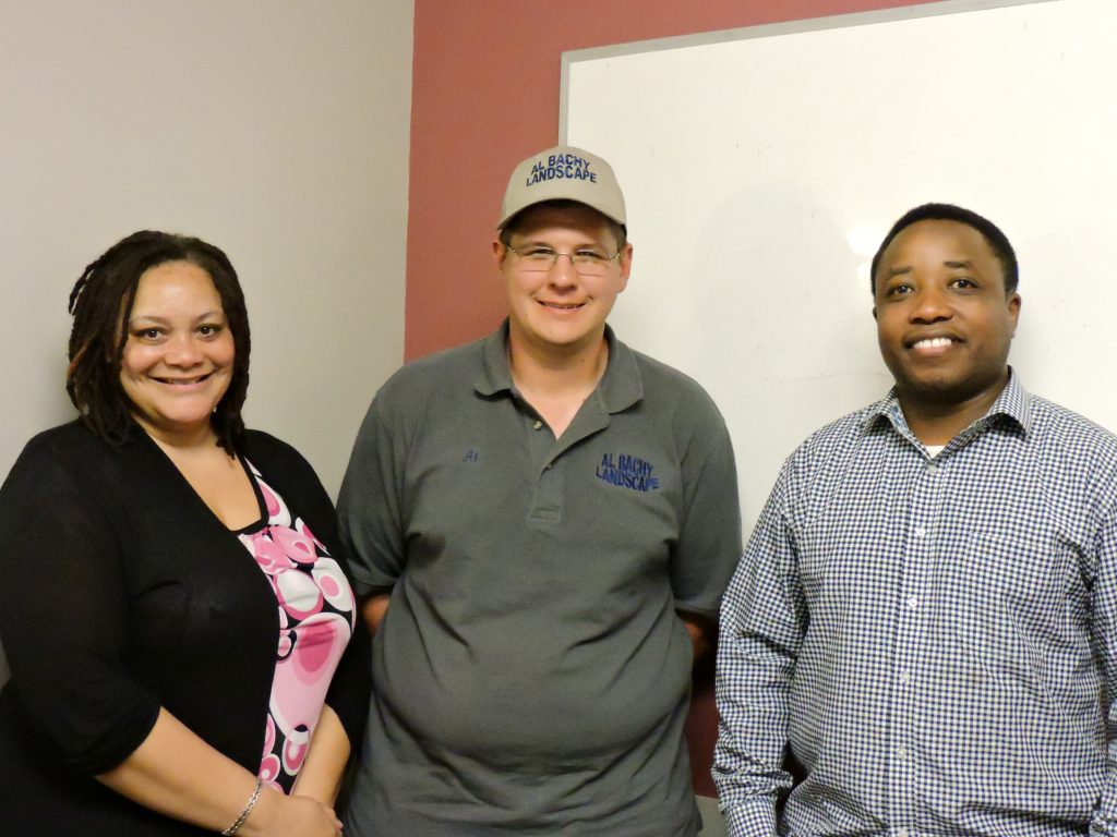 FOC Client, Al Bachy, with FOC staffers Samson Murage and Tracey Reaves