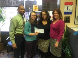 Heavenly Hair - Monique: Final disbursement for Heavenly Hair & Beauty Salon’s sign project with WCDC Staff Gordon Manker, Jennifer Salmans, Monique Shorter – Owner of Heavenly Hair, and Tracey Evans (left – right).