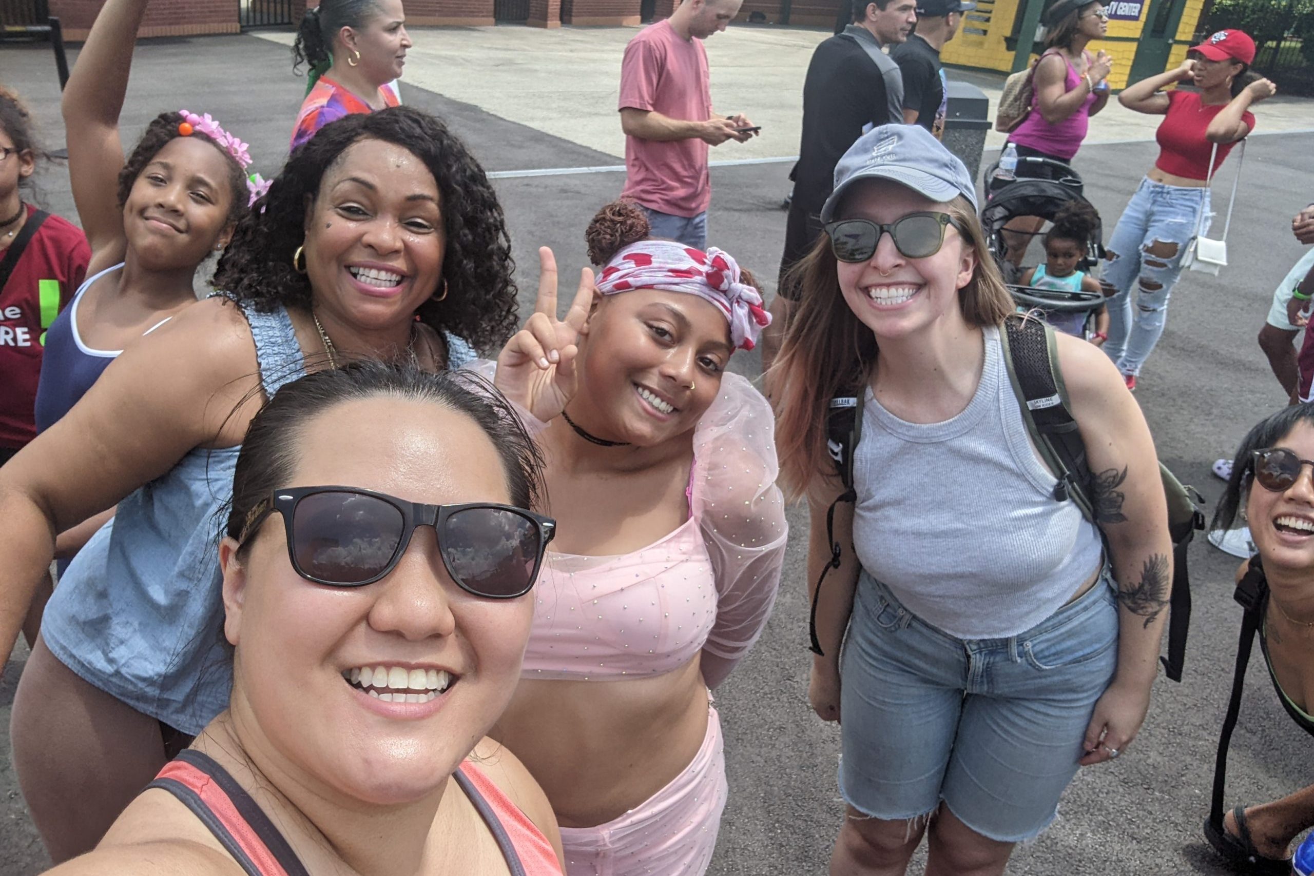 A selfie of several of our staff members at Kennywood. Everyone is smiling at the camera.